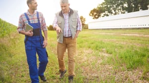 two farmers walking with tablet-1