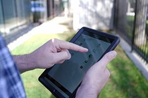 Man to tablet