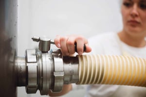 Milk flowing through pipe
