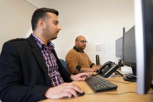 Staff looking at computer