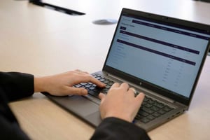 typing formula on laptop
